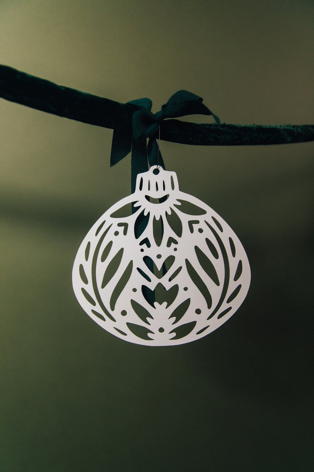Nordic paper ornament on tree - festive Scandinavian paper decor by Hinterland Goods