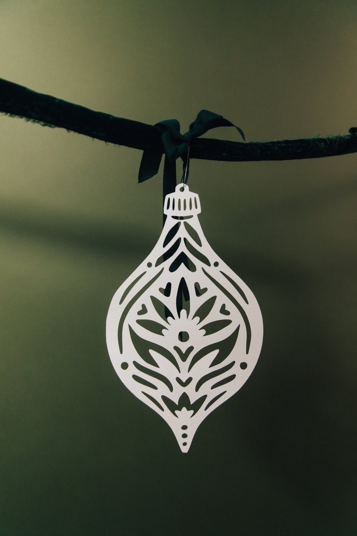Paper ornament detail showing pattern - large holiday paper garland by Hinterland Goods