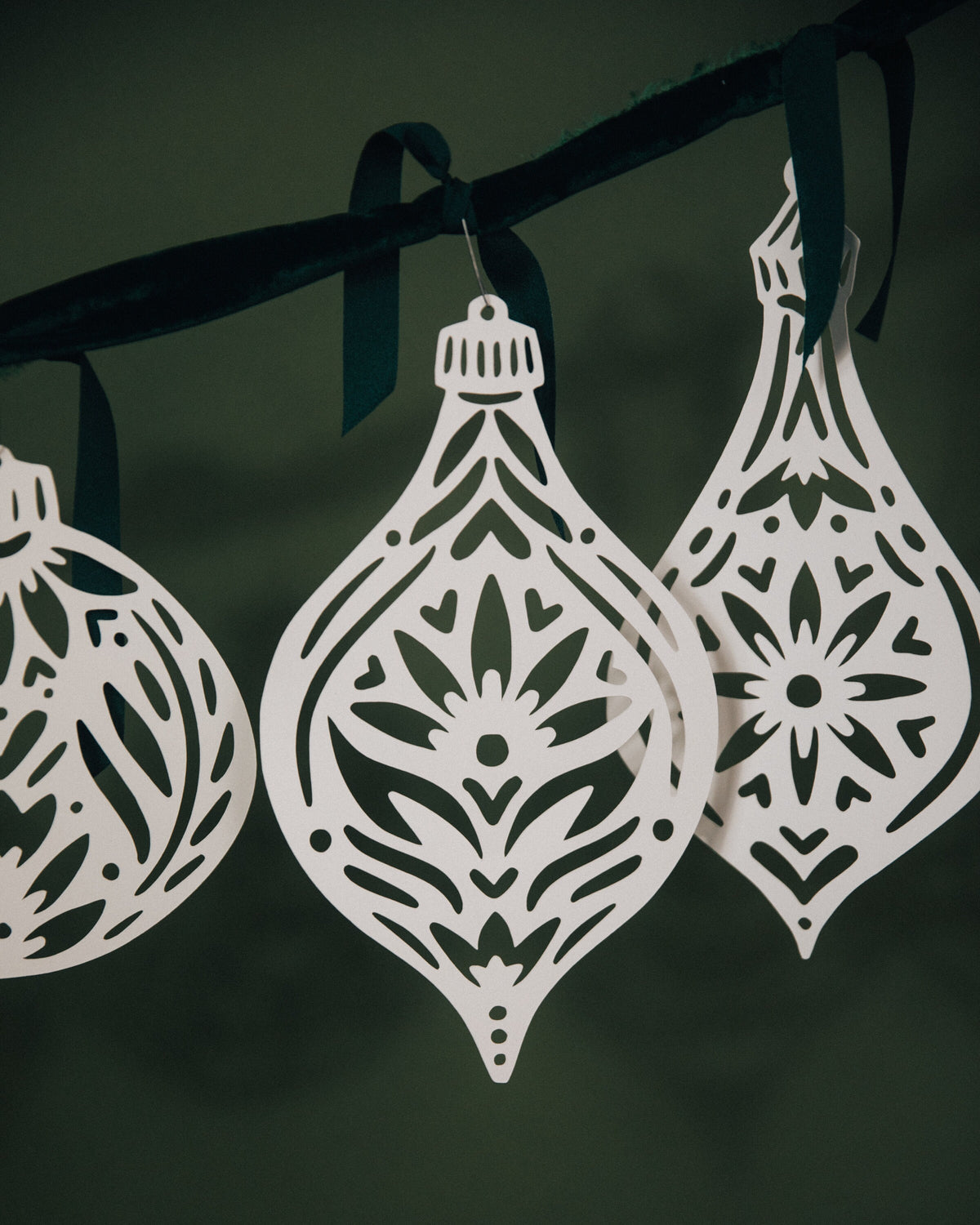 Paper ornament styled on mantel - Nordic Christmas decor by Hinterland Goods