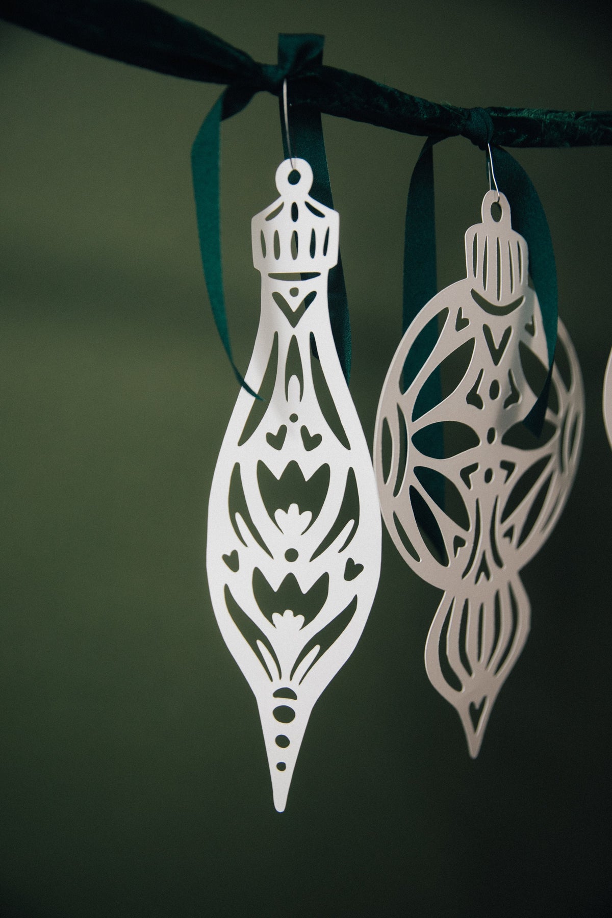 Paper ornament styled with greenery - Nordic holiday paper decor by Hinterland Goods